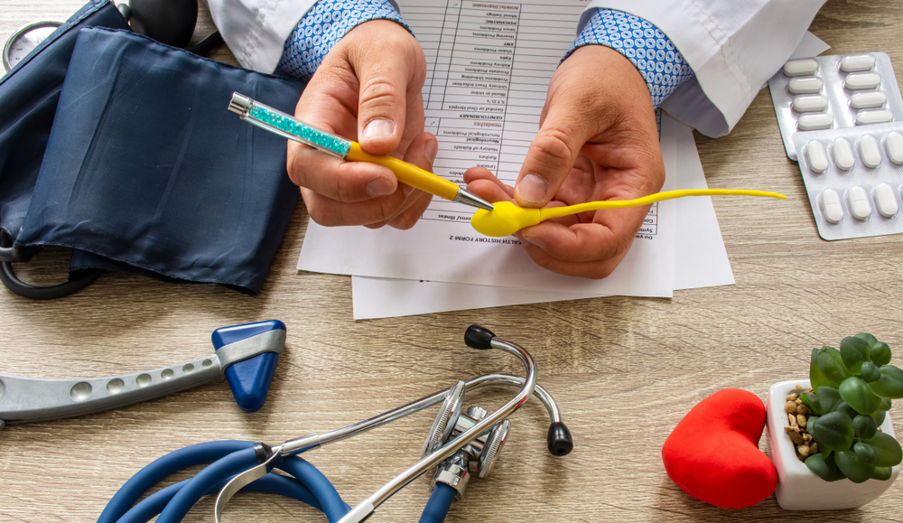 doctor counseling patient about vasectomy.