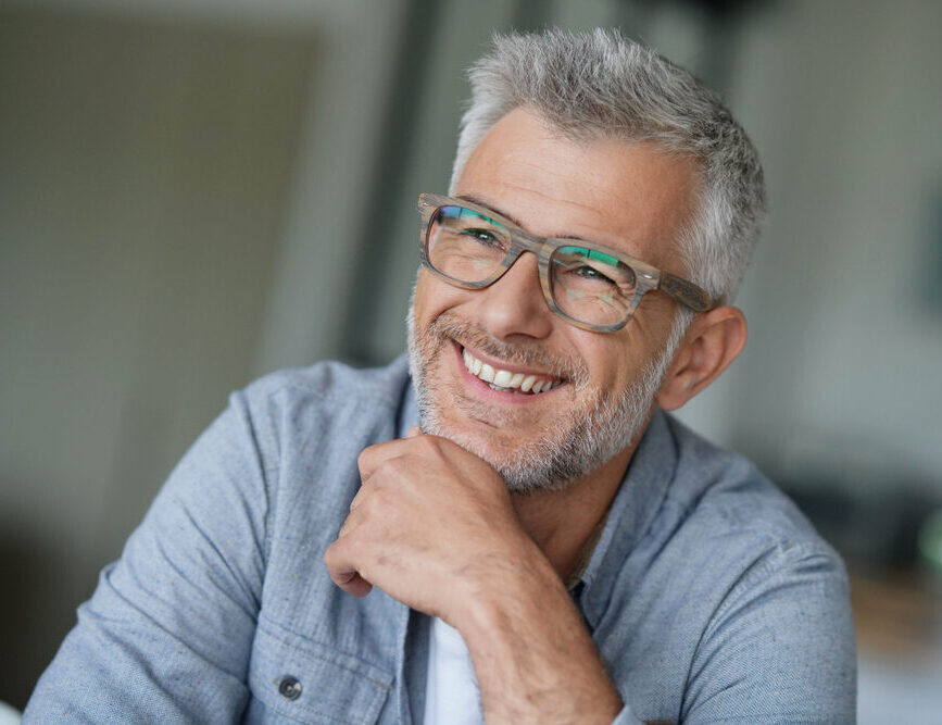 man smiling after having had a vasectomy.