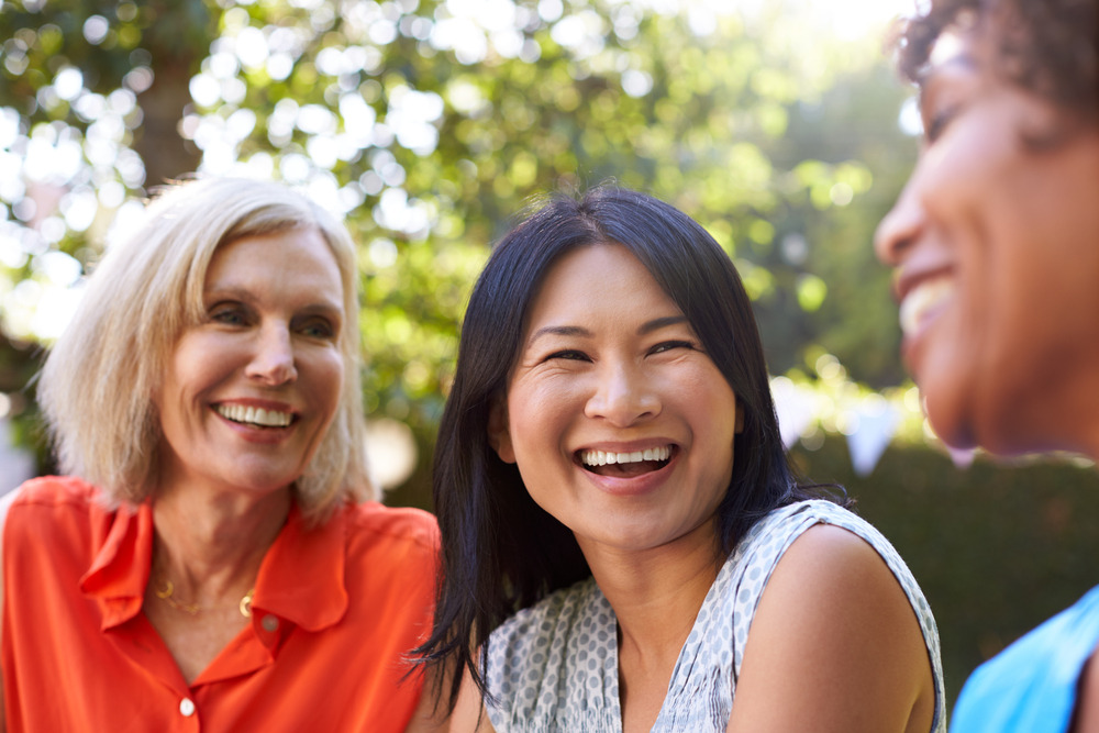 Group of women laughing.