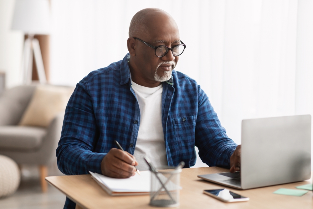 Man researching ED.